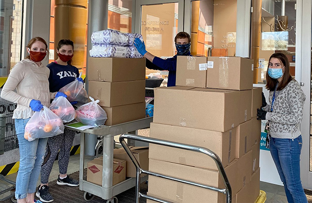 Volunteers recently helped JFS during a Sunday morning delivery of food and household items to JFS clients who are unable to pick up their monthly supplies.