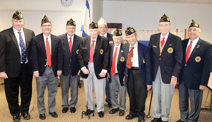 The JWV MO-KAN Post 605 held its annual installation of officers at the JCC on June 14, swearing in Bernie Brownstein as Post commander and his team of officers. Pictured here are Bill Greenberg (from left), senior vice commander; Bill Adelman, junior vice commander; Scott Bronston, quartermaster; Bernie Brownstein, Post commander; Larry Gordon, Department of Midwest commander; Marv Korn, Americanism officer; Herb Gruenebaum, chaplain; Lloyd Hellman, judge advocate; and Sheldon Turetsky, historian and publicity. Not shown: Irv Fudemberg, service officer, and Marvin Denton, communications officer.