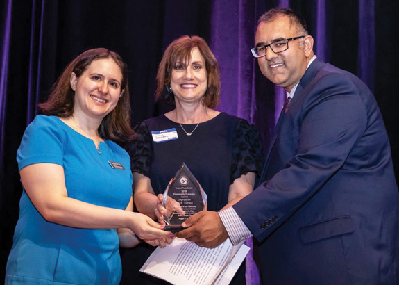 Congregation Beth Torah received the Community Outreach Award from the Crescent Peace Society at the CPS 22nd Annual Awards Dinner in July for its work toward unity in our community by hosting programs such as Meet a Muslim and Teen Meet a Muslim. Pictured receiving the award are Rabbi Monica Kleinman, from left, director of lifelong learning for Beth Torah; Denise Ellenberg, who co-chaired the Meet a Muslim programs with Denise Pakula; and the president of the Crescent Peace Society, Ahsan Latif.